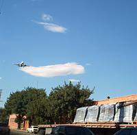 Truck of tilemolds and airplane landing